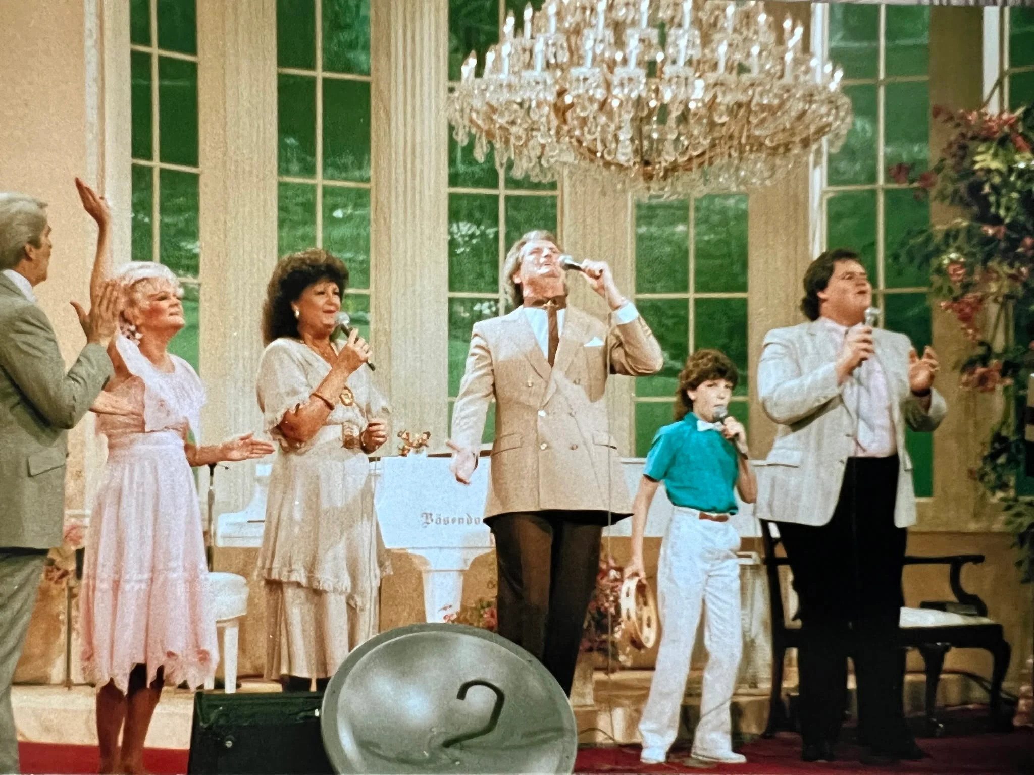 Terry Tripp singing with his family at a ministry event